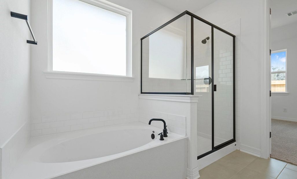 Primary bathroom.Sample product photo. Actual exterior and interior selections may vary by homesite.