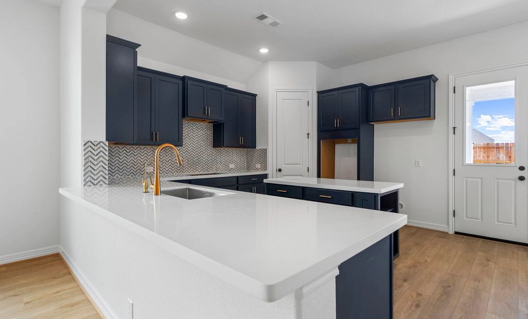 Kitchen. Sample product photo. Actual exterior and interior selections may vary by homesite. Photo