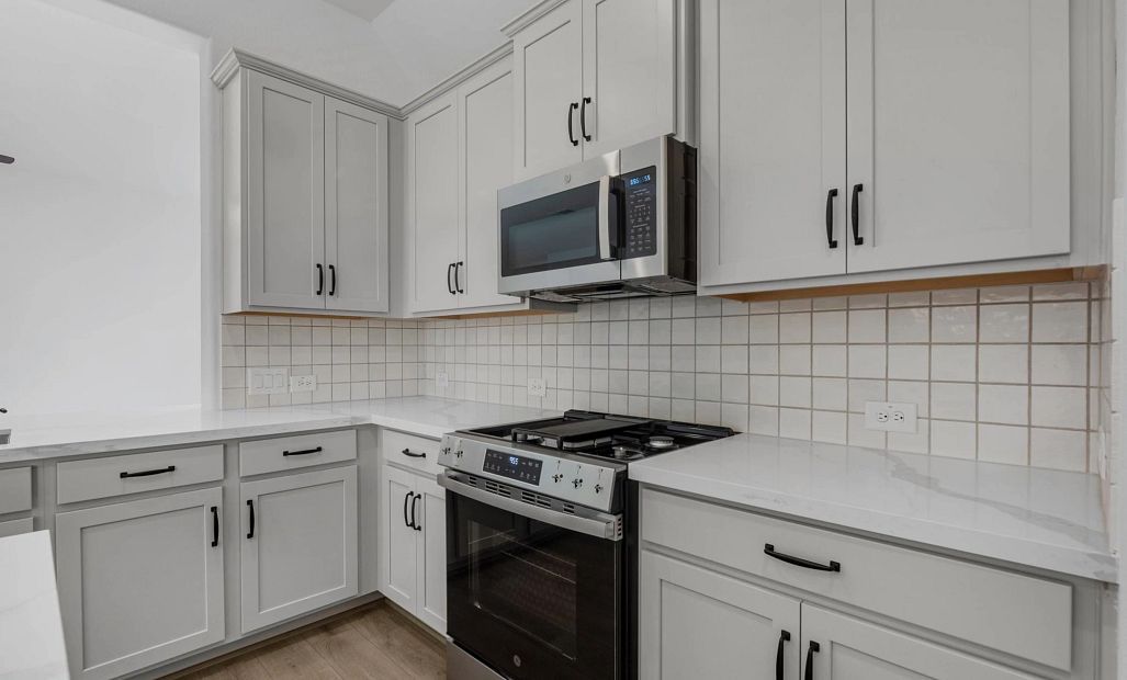 Kitchen. Sample product photo. Actual exterior and interior selections may vary by homesite. Photo