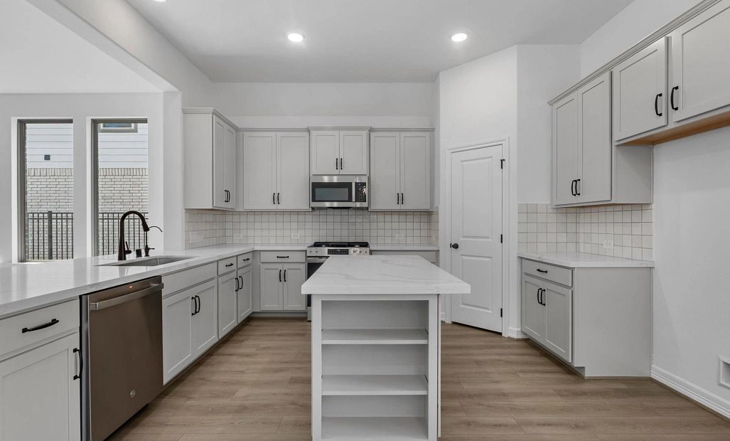 Kitchen. Sample product photo. Actual exterior and interior selections may vary by homesite. Photo