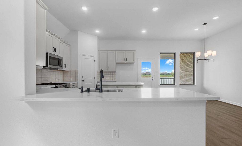 Kitchen. Sample product photo. Actual exterior and interior selections may vary by homesite. Photo