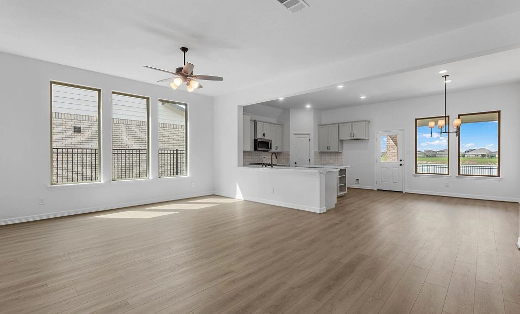 Gathering room. Sample product photo. Actual exterior and interior selections may vary by homesite.