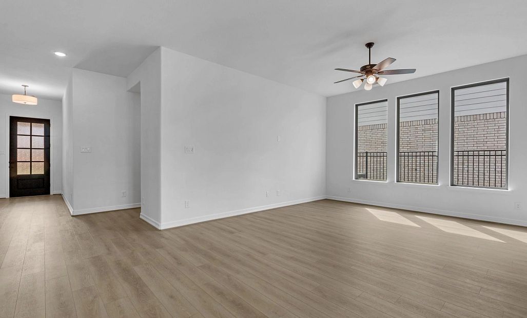 Gathering room. Sample product photo. Actual exterior and interior selections may vary by homesite.