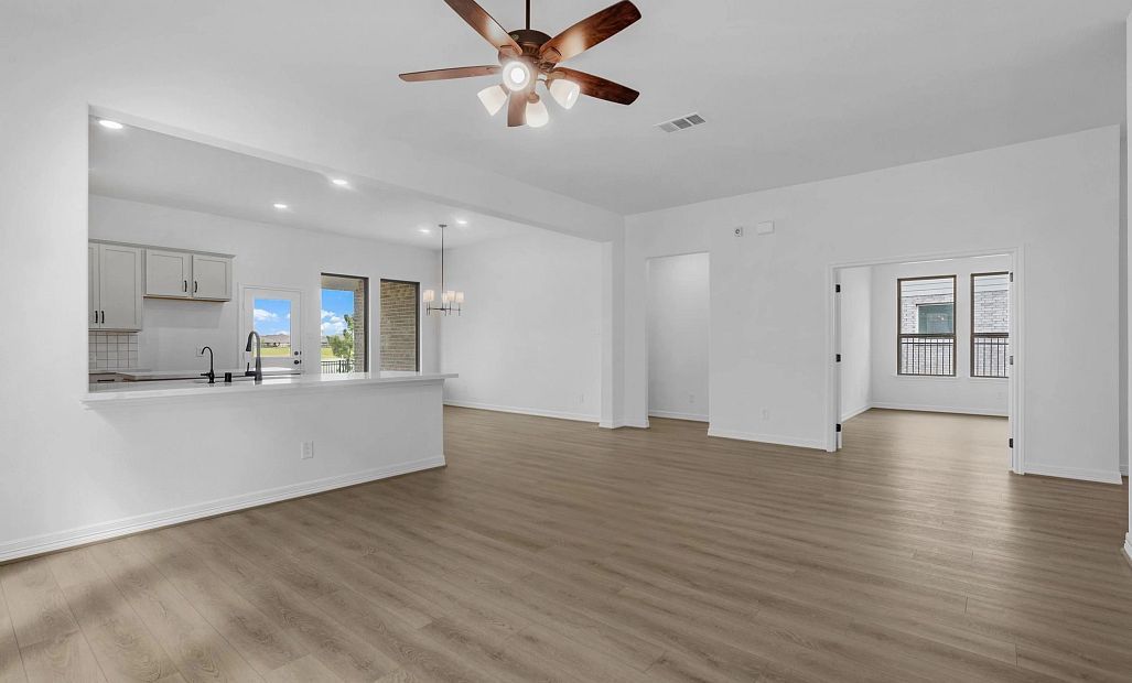 Gathering room. Sample product photo. Actual exterior and interior selections may vary by homesite.