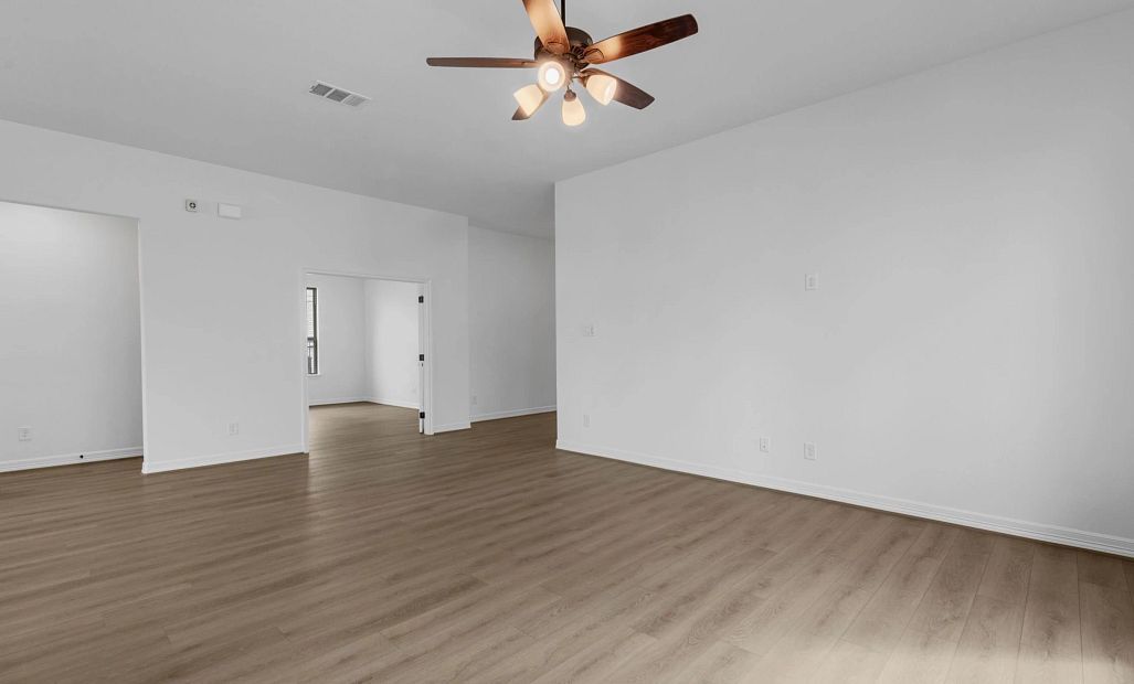 Gathering room. Sample product photo. Actual exterior and interior selections may vary by homesite.