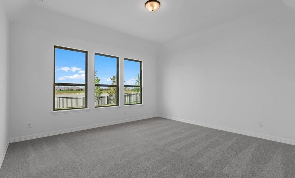 Primary bedroom. Sample product photo. Actual exterior and interior selections may vary by homesite.