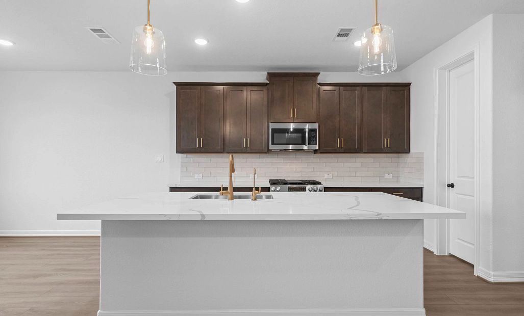 Kitchen. Sample product photo. Actual exterior and interior selections may vary by homesite. Photo