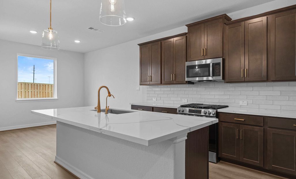 Kitchen. Sample product photo. Actual exterior and interior selections may vary by homesite. Photo