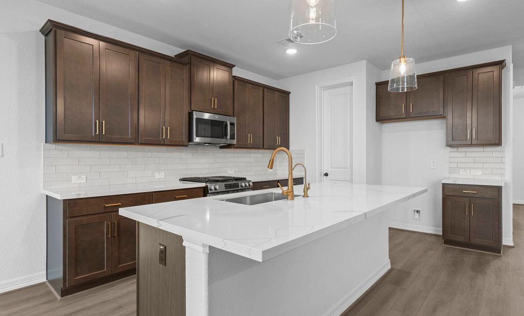 Kitchen. Sample product photo. Actual exterior and interior selections may vary by homesite. Photo