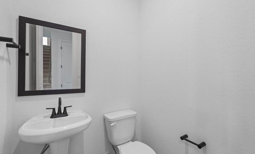 Half bathroom. Sample product photo. Actual exterior and interior selections may vary by homesite.