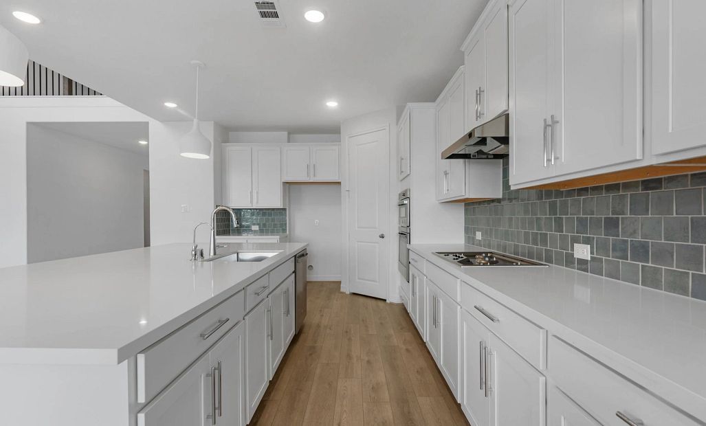 Kitchen. Sample product photo. Actual exterior and interior selections may vary by homesite. Photo