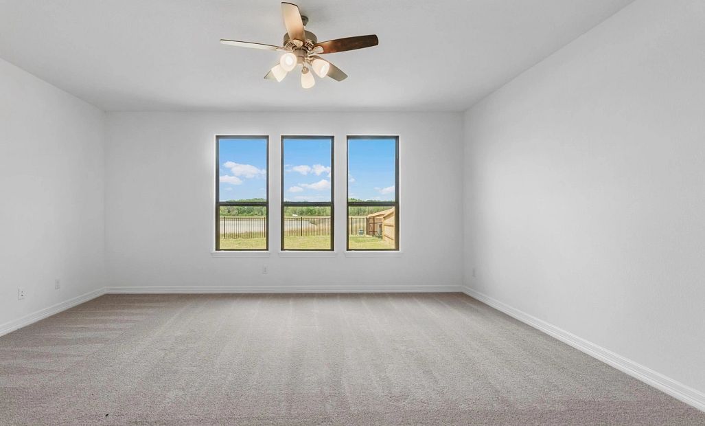 Primary bedroom. Sample product photo. Actual exterior and interior selections may vary by homesite.
