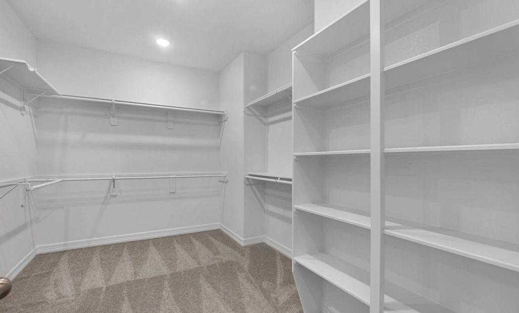Primary closet. Sample product photo. Actual exterior and interior selections may vary by homesite.