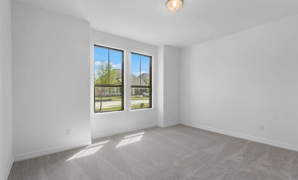 Secondary bedroom. Sample product photo. Actual exterior and interior selections may vary by