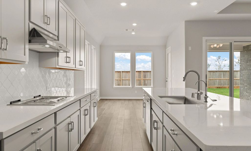 Kitchen. Sample product photo. Actual exterior and interior selections may vary by homesite. Photo