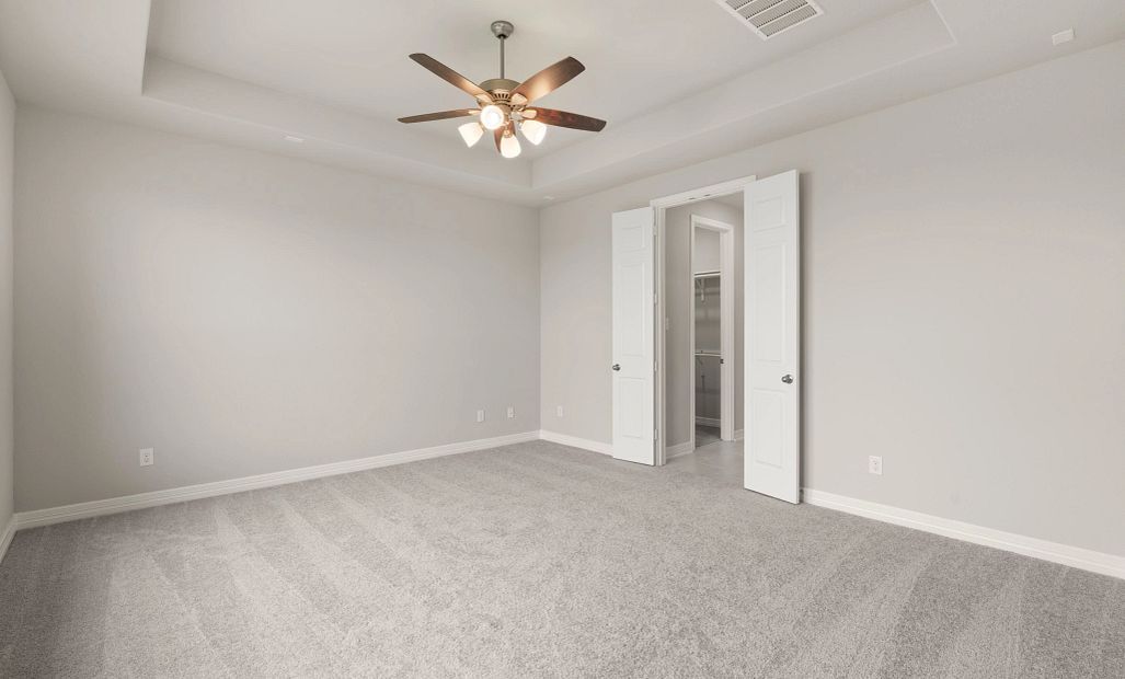 Primary bedroom. Sample product photo. Actual exterior and interior selections may vary by homesite.