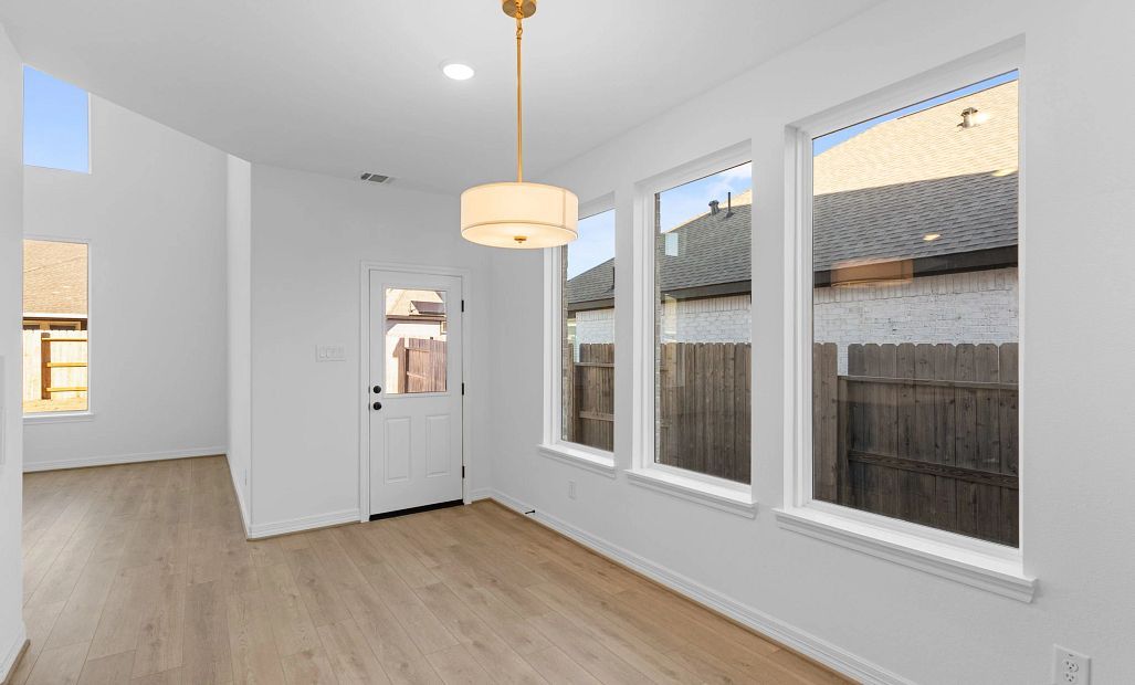 Dining space. Sample product photo. Actual exterior and interior selections may vary by homesite.