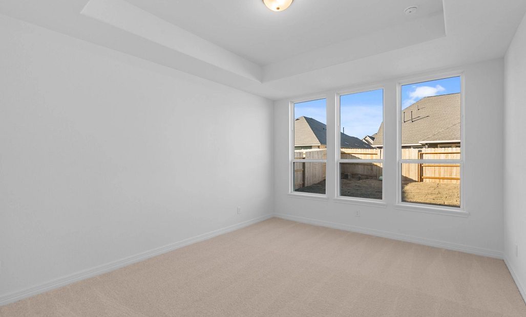 Primary bedroom. Sample product photo. Actual exterior and interior selections may vary by homesite.