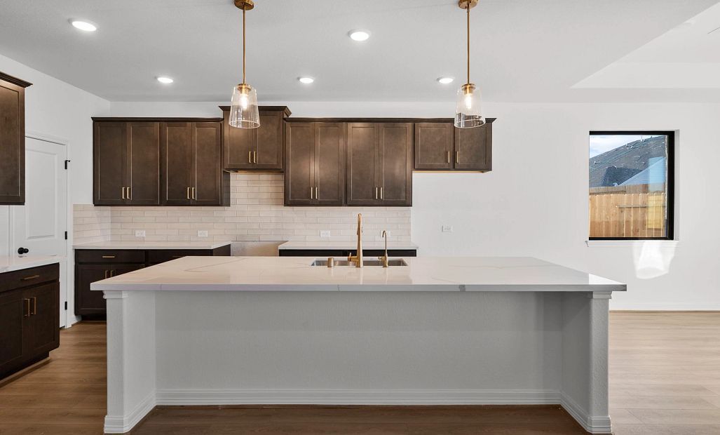 Kitchen. Sample product photo. Actual exterior and interior selections may vary by homesite. Photo