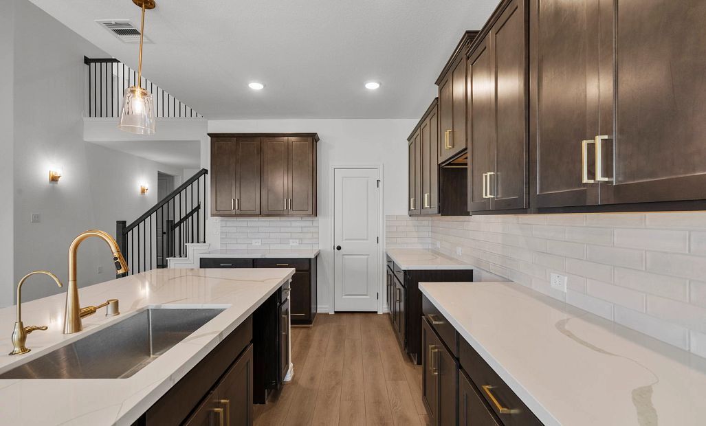 Kitchen. Sample product photo. Actual exterior and interior selections may vary by homesite. Photo