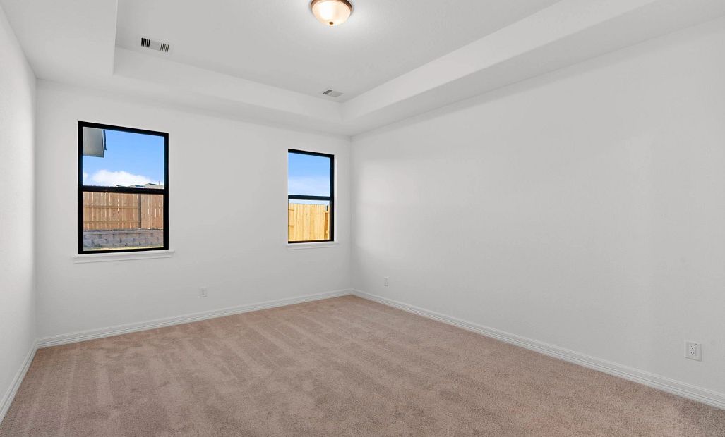 Primary bedroom. Sample product photo. Actual exterior and interior selections may vary by homesite.