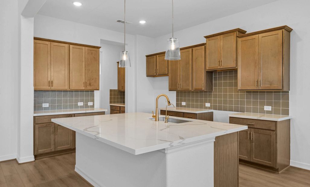 Kitchen. Sample product photo. Actual exterior and interior selections may vary by homesite. Photo