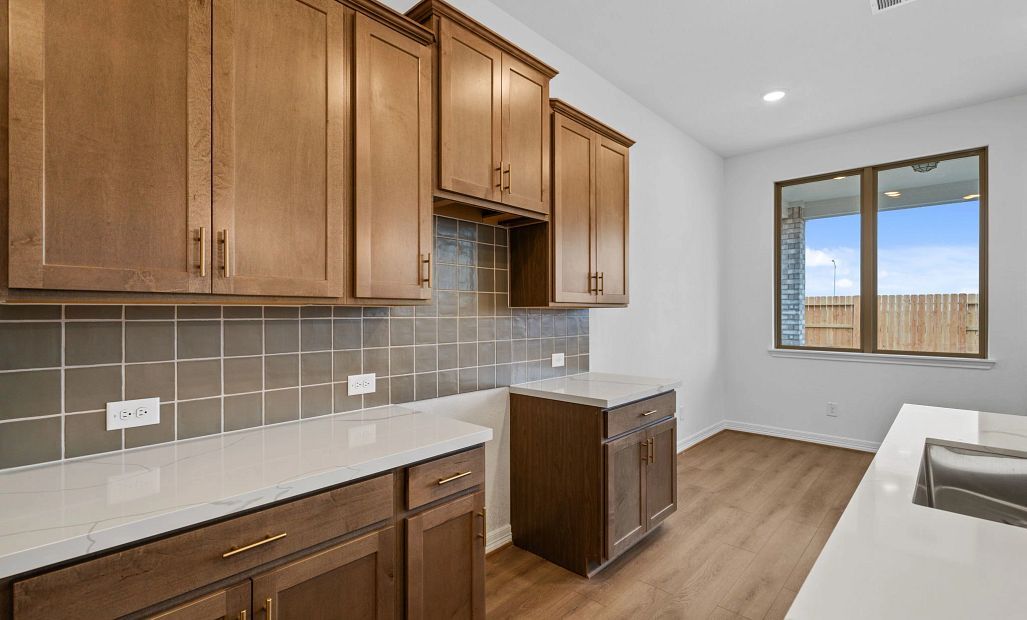 Kitchen. Sample product photo. Actual exterior and interior selections may vary by homesite. Photo