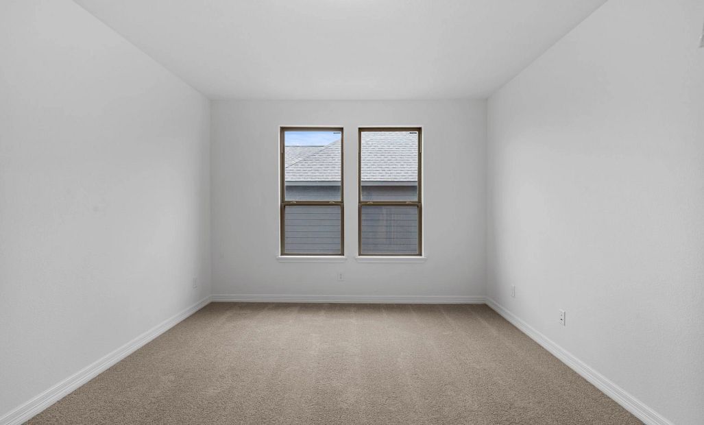 Primary bedroom. Sample product photo. Actual exterior and interior selections may vary by homesite.
