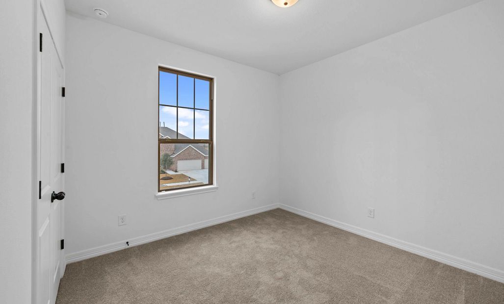 Secondary bedroom. Sample product photo. Actual exterior and interior selections may vary by
