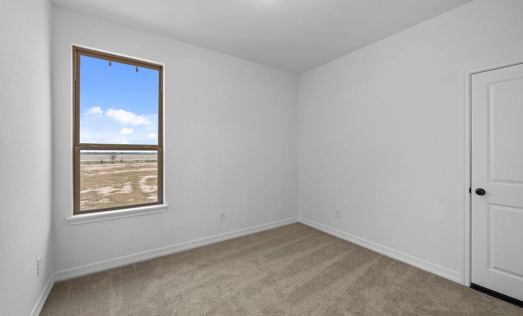 Fourth bedroom. Sample product photo. Actual exterior and interior selections may vary by homesite.