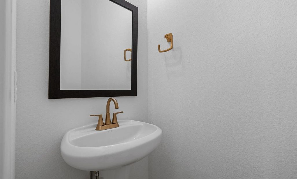 Half bathroom. Sample product photo. Actual exterior and interior selections may vary by homesite.