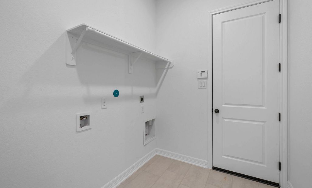 Laundry room. Sample product photo. Actual exterior and interior selections may vary by homesite.