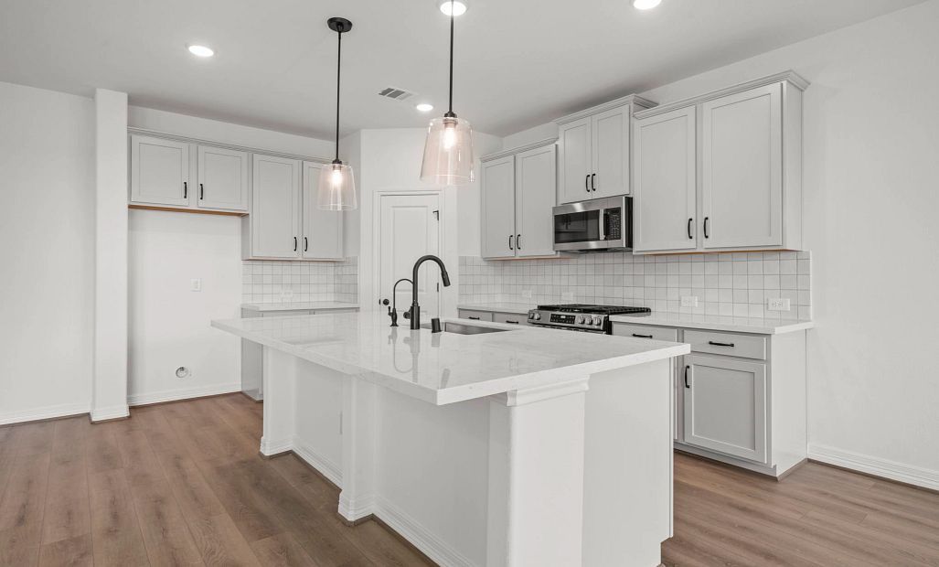 Kitchen. Sample product photo. Actual exterior and interior selections may vary by homesite. Photo