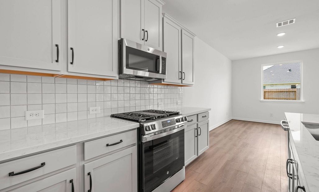Kitchen. Sample product photo. Actual exterior and interior selections may vary by homesite. Photo