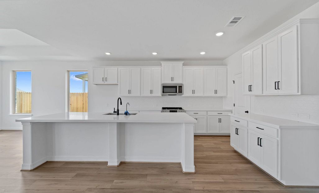 Kitchen. Note: Sample product photo - actual exterior and interior selections may vary by homesite
