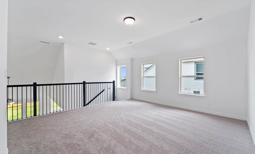 Game room. Note: Sample product photo - actual exterior and interior selections may vary by homesite
