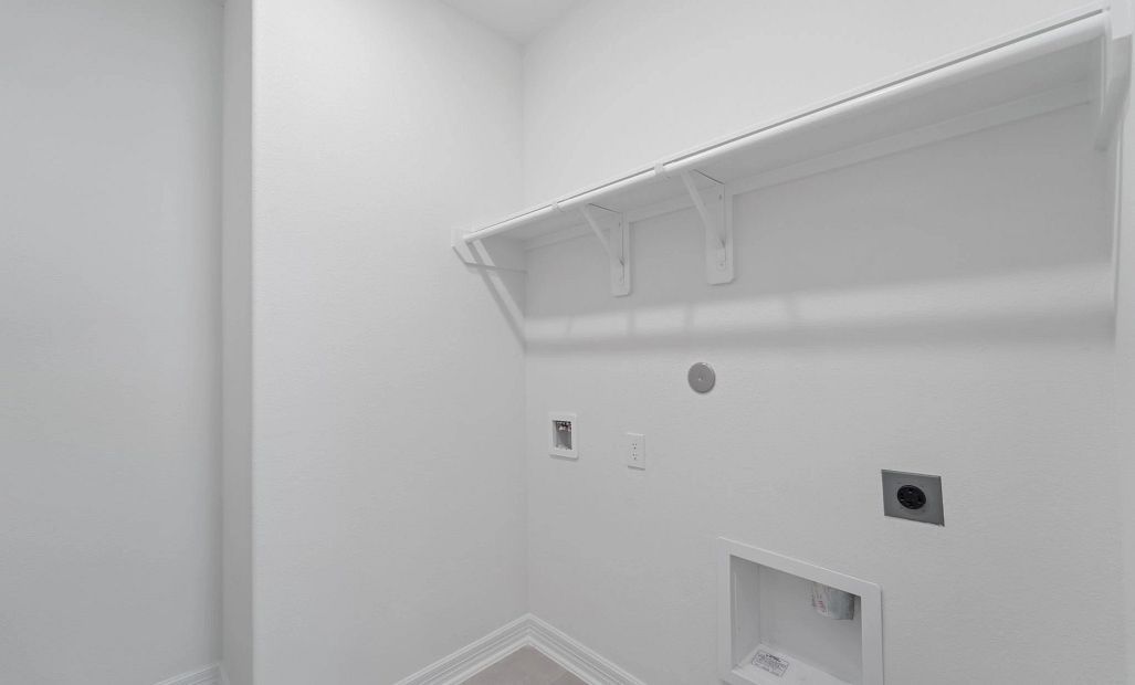 Utility room. Note: Sample product photo - actual exterior and interior selections may vary by