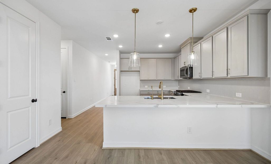 Kitchen. Sample product photo. Actual exterior and interior selections may vary by homesite. Photo