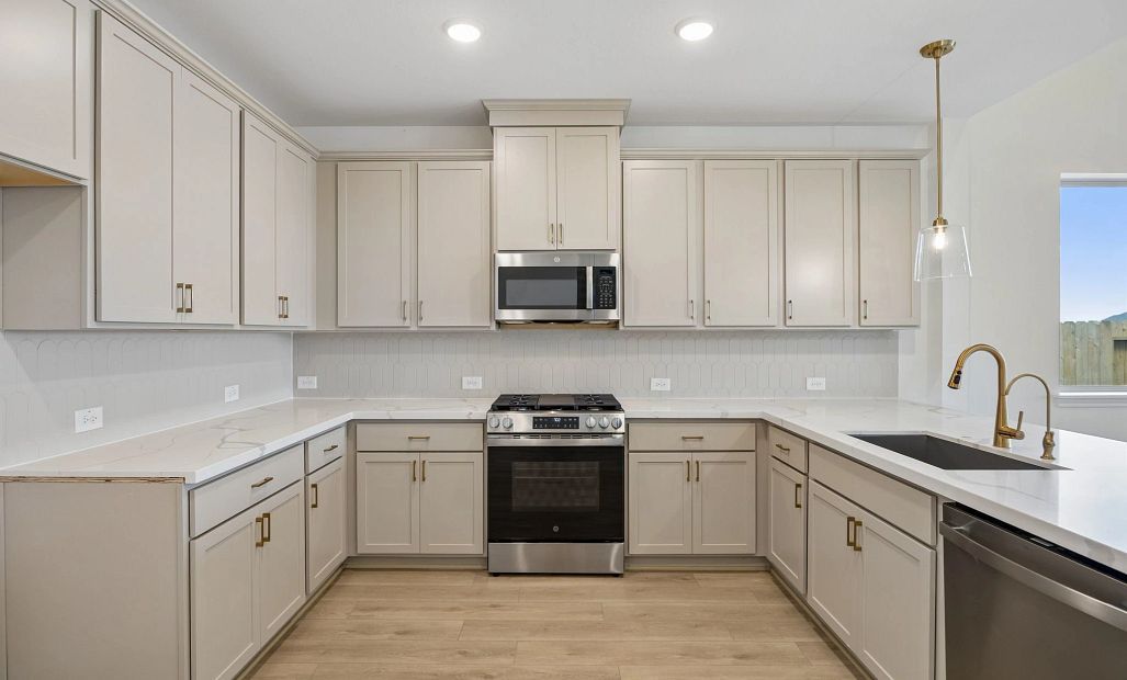 Kitchen. Sample product photo. Actual exterior and interior selections may vary by homesite. Photo