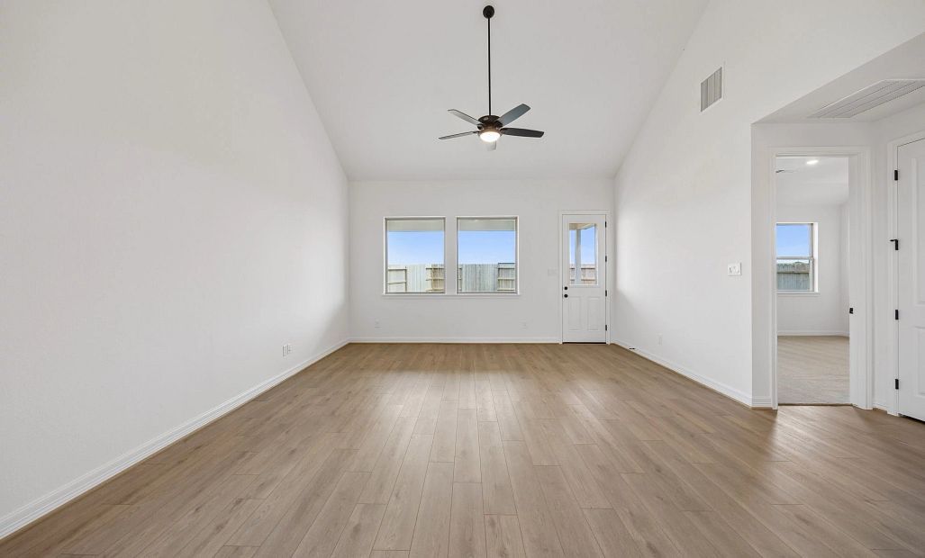 Gathering room. Sample product photo. Actual exterior and interior selections may vary by homesite.