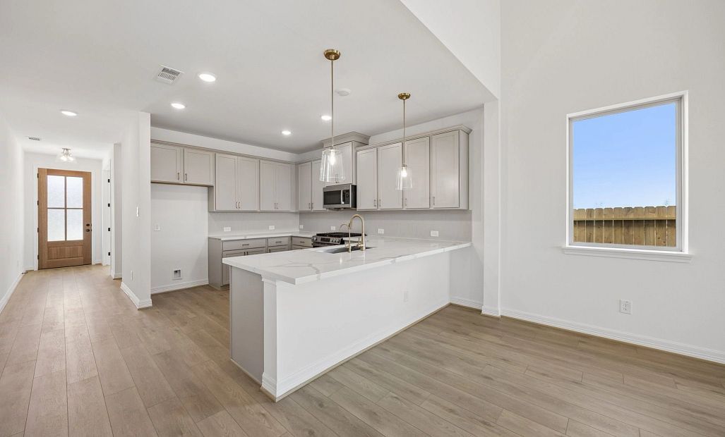 Kitchen. Sample product photo. Actual exterior and interior selections may vary by homesite. Photo