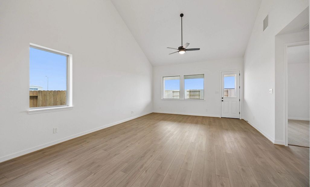 Gathering room. Sample product photo. Actual exterior and interior selections may vary by homesite.