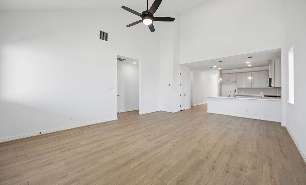 Gathering room. Sample product photo. Actual exterior and interior selections may vary by homesite.