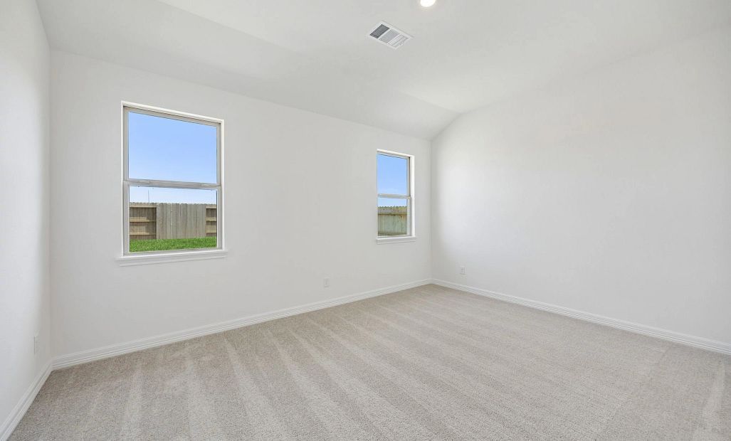 Primary bedroom. Sample product photo. Actual exterior and interior selections may vary by homesite.