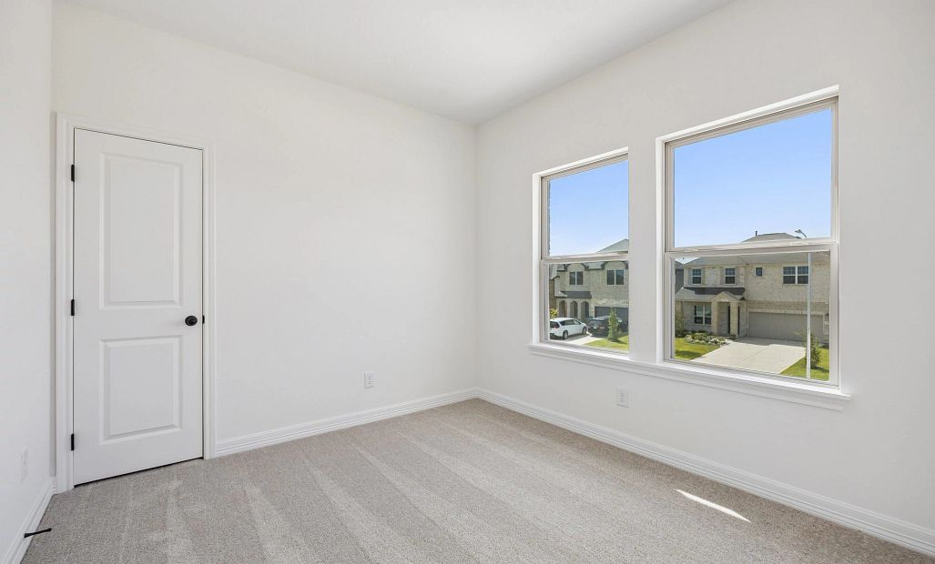 Secondary bedroom. Sample product photo. Actual exterior and interior selections may vary by