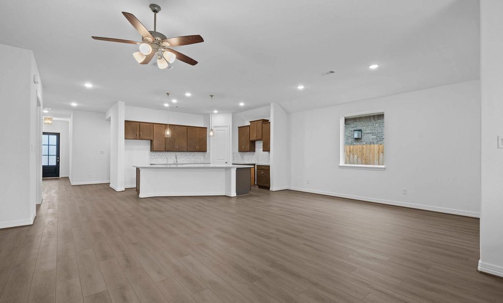 Gathering room. Sample product photo. Actual exterior and interior selections may vary by homesite.