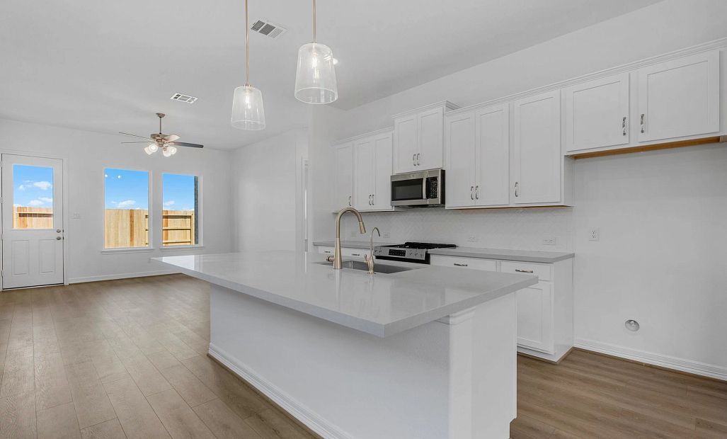 Kitchen. Sample product photo. Actual exterior and interior selections may vary by homesite. Photo