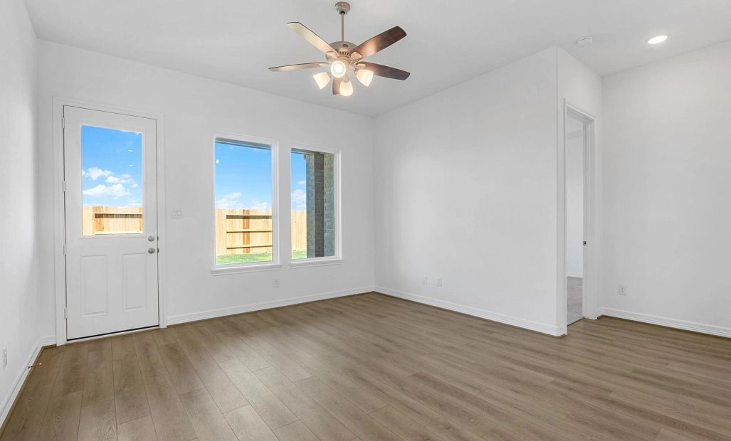 Gathering room. Sample product photo. Actual exterior and interior selections may vary by homesite.