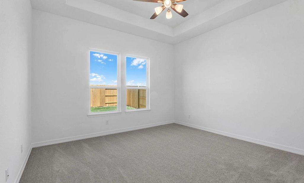 Primary bedroom. Sample product photo. Actual exterior and interior selections may vary by homesite.