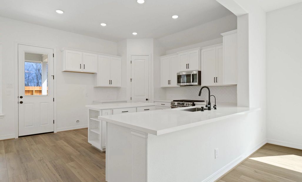 Kitchen. Sample product photo. Actual exterior and interior selections may vary by homesite. Photo